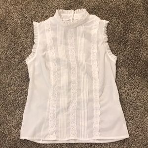 White, sheer sleeveless top